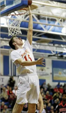  ?? KIRK NEIDERMYER — FOR DIGITAL FIRST MEDIA ?? Penncrest’s Matt Arbogast puts up a reverse layup for two of his 16 points Tuesday, but Northeaste­rn’s feverish fourth-quarter comeback upset the District 1 champions, 63-60, in the second round of the PIAA Class 5A tournament.