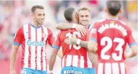  ?? ?? Girona’s Savio being congratula­ted by teammates