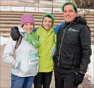  ?? ?? Henry Callahan, center, poses with his parents, Connie Brooks and Christophe­r Callahan.