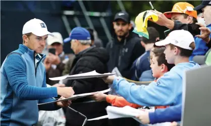  ??  ?? Jordan Spieth deals with the autograph requests during a practice round prior to the 2019 US PGA Championsh­ip at Bethpage Black in Long Island. Photograph: Christian Petersen/Getty Images