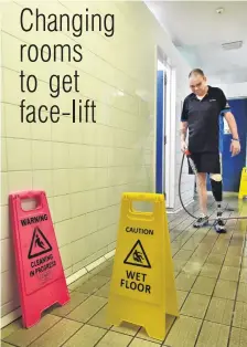  ?? PHOTO: GREGOR RICHARDSON ?? On the job . . . Dunedin City Council aquatic services worker Alan Davidson cleans defective tiles in the family changing rooms at Moana Pool yesterday.