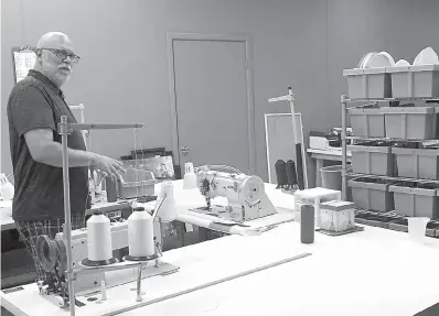  ?? Staff photos by Neil Abeles ?? below Rex and Sherry Thain have the all-important sewing tables and machines to put together their Ride Right bull riding protective vests.