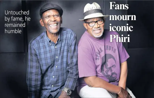  ??  ?? LEGENDARY PAIR: Ray Phiri, left, with Sipho ‘Hotstix’ Mabuse at The Star building in central Joburg. They put on shows to packed audiences, delighting their fans.