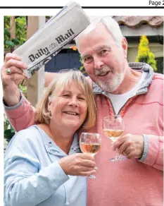  ??  ?? Cheers! Deborah and David Hubbard toast their win