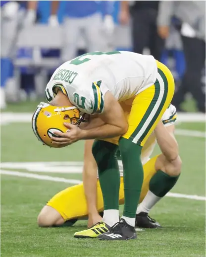  ?? PAUL SANCYA/AP ?? Mason Crosby reacts after missing his third field-goal attempt of the game. He would miss one more and an extra-point try.