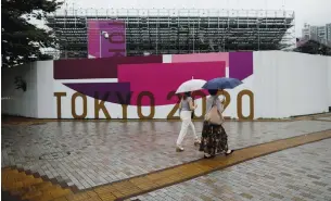  ?? (Issei Kato/Reuters) ?? SCAFFOLDIN­GS FOR spectator seats are seen at Tokyo’s Aomi Urban Sports Park yesterday, ahead of the opening of the 2020 Tokyo Olympic Games.