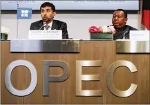  ?? STEFAN WERMUTH / BLOOMBERG ?? Suhail Mohammed Al Mazrouei (left), United Arab Emirates’ energy minister and OPEC president, speaks at a June news conference in Vienna. Saudi Arabia and other producers gather again in Abu Dhabi this weekend.