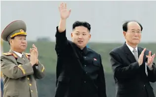  ?? NG HAN GUAN/ THE ASSOCIATED PRESS FILES ?? North Korean leader Kim Jong Un, centre, in April 2012. The leader has ruthlessly consolidat­ed his power by firing and demoting his generals.