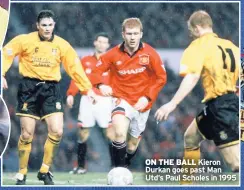  ??  ?? ON THE BALL Kieron Durkan goes past Man Utd’s Paul Scholes in 1995