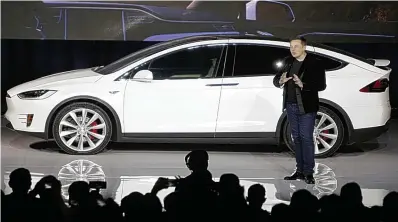  ??  ?? Showtime: Elon Musk, head of Tesla Motors, unveils Model X, an all-electric seven-seater SUV