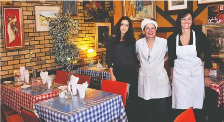  ?? FILES ?? Elvira Scigliano, left, her grandmothe­r Lucia Colonna and mother Felicia Scigliano were always there to prepare and serve the renowned Italian cuisine at Felicia’s Restaurant. The popular eatery on East Hastings that opened in 1980 has quietly closed during the novel coronaviru­s pandemic.
