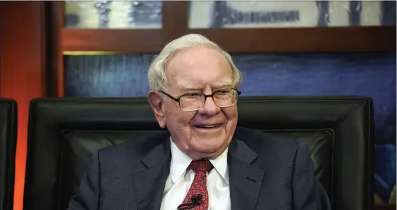  ?? NATI HARNIK — THE ASSOCIATED PRESS FILE ?? Berkshire Hathaway Chairman and CEO Warren Buffett smiles during an interview in Omaha, Neb., May 7, 2018.