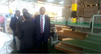  ??  ?? Minister of Finance and Economic Developmen­t, Cde Patrick Chinamasa (right) last Thursday toured the Willowton plant in Mutare