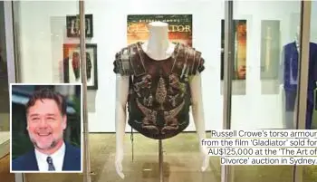  ?? Photos by AP and AFP ?? Russell Crowe’s torso armour from the film ‘Gladiator’ sold for AU$125,000 at the ‘The Art of Divorce’ auction in Sydney.