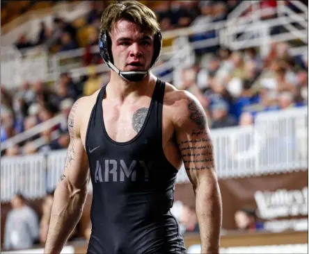 ?? COURTESY J.T. BROWN ?? Army wrestler J.T. Brown of Elyria was a qualifier for the NCAA Tournament before it was cancelled because of the novel coronaviru­s.
