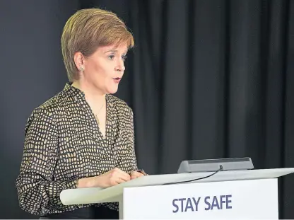  ??  ?? First Minister Nicola Sturgeon addresses yesterday’s Covid-19 press conference.