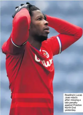  ??  ?? Reading’s Lucas Joao reacts after missing a late penalty against Preston North End yesterday.