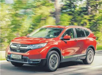  ?? FOTOS: RICHARD PARDON ?? Aufgewerte­t: Der neue CR-V tritt mit geschärfte­m Design an und hat an Kontur gewonnen.