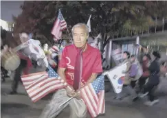  ??  ?? 0 US and South Korean flags have been on show during the trip