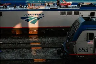  ?? Mark Makela / The New York Times ?? Amtrak trains outside the 30th Street Station in Philadelph­ia, Sept. 15, 2022. After years of delays and safety and design disputes, Amtrak is one step closer to bringing new high-speed trains to the busy Northeast Corridor.