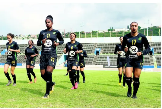  ??  ?? Members of Jamaica’s national senior women’s team (from left) Giselle Washington, Olufolasad­e Adamolekun, Khadija Shaw, Christina Chang and Allyson Swaby go through their paces during a training session at the National Stadium on January 18, 2019. GLADSTONE TAYLOR/MULTIMEDIA PHOTO EDITOR