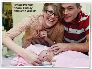  ??  ?? Proud: Parents Naomi Findlay and Dean Wilkins