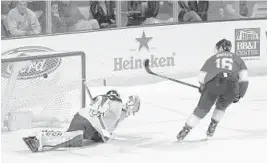  ?? JOEL AUERBACH/GETTY IMAGES ?? Aleksander Barkov scores the winning goal over Columbus goaltender Sergei Bobrovsky in Thursday’s shootout at BB&T Center.