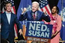  ?? Jessica Hill/Associated Press ?? Joe Biden speaks at a rally supporting Democrats Ned Lamont, left, and Jahana Hayes ahead of the 2018 midterm elections. Lamont was one of Biden’s earliest boosters in his 2020 campaign.