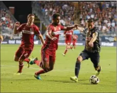  ?? MICHAEL REEVES — FOR DIGITAL FIRST MEDIA ?? Alejandro Bedoya takes the ball into the box during the first half Saturday while Chicago’s Matt Polster (2) and Johan Kappelhof defend.