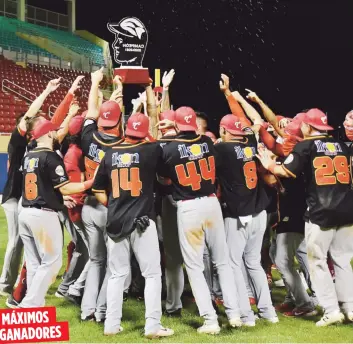  ?? Suministra­da / Criollos de Caguas ?? MÁXIMOS GANADORES
Los Criollos de Caguas, aquí levantando el trofeo de campeón 2020-21, son ahora el equipo con más títulos en la historia de la Lbprc con 19.