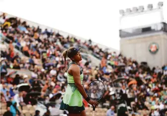  ?? Ryan Pierse / Getty Images ?? Naomi Osaka lost in the first round to American Amanda Anisimova at the French Open.