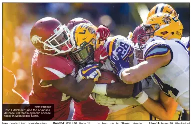  ?? PHOTO BY BEN GOFF ?? Josh Liddell (left) and the Arkansas defense will face a dynamic offense today in Mississipp­i State.