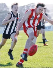  ??  ?? Fourths player Harry Hopkins in action against a much stronger Yinnar team on Saturday.