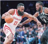  ?? KATHY WILLENS/AP ?? Rockets guard James Harden scored 36 points in a win over the Nets.