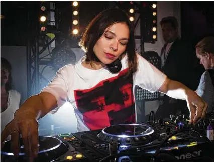  ?? DEIDRE SCHOO / NYT ?? A growing network of booking agencies and community groups have made female artists, like Nina Kraviz, more visible in Berlin, erasing the boys club atmosphere of the past.