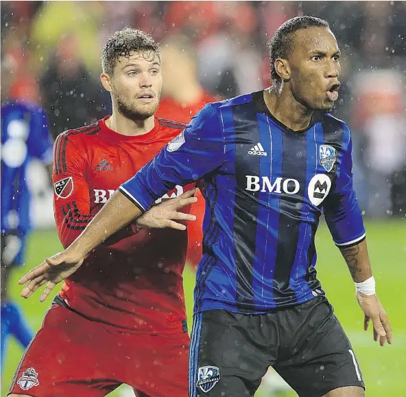  ?? — GETTY IMAGES FILES ?? Toronto FC’s Eriq Zavaleta, left, has a unique perspectiv­e heading into Saturday’s MLS Cup final against the Seattle Sounders. Zavaleta is the lone Toronto FC player to have also played in Seattle, getting drafted by the Sounders at 10th overall in 2013.