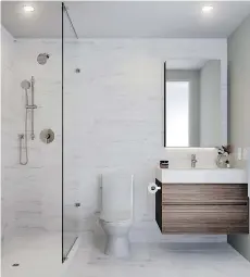  ?? PNG MERLIN ARCHIVE ?? Floating vanities in the bathroom create a space that is easy to clean while making the room appear more spacious.