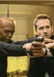  ?? Foto: dpa ?? Ryan Reynolds (r.) als Michael Bryce und Samuel L. Jackson als Darius.