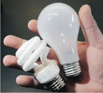  ?? JUSTIN SULLIVAN/ GETTY IMAGES FILES ?? The CFL bulb, left, will soon be replacing the incandesce­nt bulb.