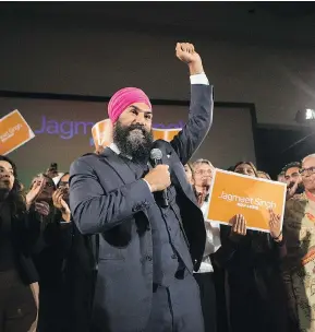  ?? CHRIS YOUNG / THE CANADIAN PRESS ?? Jagmeet Singh celebrated with supporters after he was elected leader of the federal New Democratic Party on the first ballot at the party’s convention in Toronto on Sunday, earning 53.8 per cent of the vote.