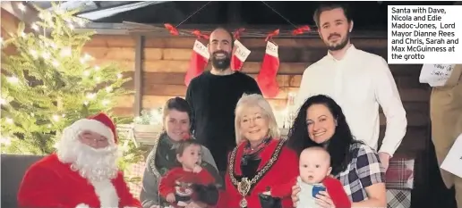  ??  ?? Santa with Dave, Nicola and Edie Madoc-Jones, Lord Mayor Dianne Rees and Chris, Sarah and Max McGuinness at the grotto