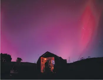  ?? ?? Hari Mogosanu and Sam Leske, of Martinboro­ugh-based Star Safari, got some great views of the aurora on Saturday night.