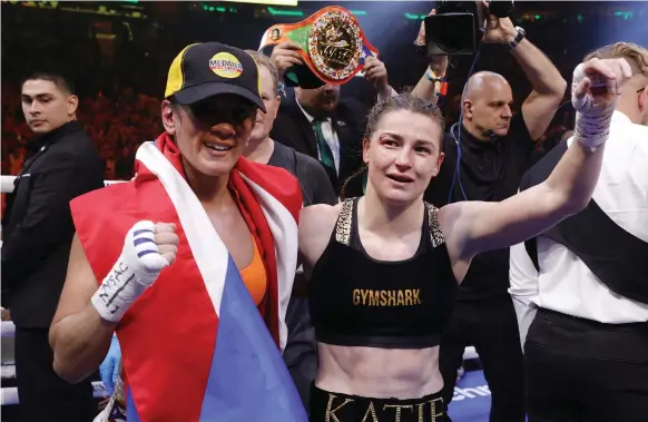  ?? AFP ?? Katie Taylor, right, with Amanda Serrano after their world-title fight at Madison Square Garden in New York on Saturday