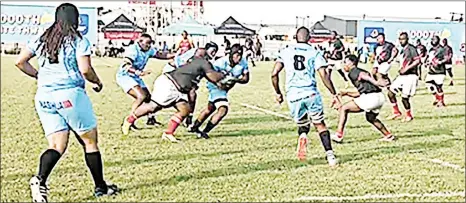  ?? (Courtesy pic) ?? Sizeze in an effort to stop Vultures driving forward during the rugby test match in Gaborone.