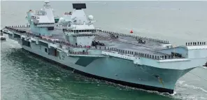 ??  ?? Proud moment: HMS Prince of Wales arrives in Portsmouth last year