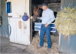  ?? ASHLEY LANDIS/AP ?? Trainer Tim Yakteen will saddle two horses in Saturday’s Kentucky Derby. Tabia, above, and Messier were both trained by Bob Baffert, who’s serving a 90-day ban.