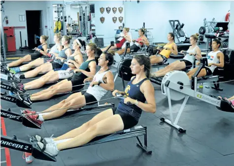  ?? PHOTO COURTESY ROWING CANADA ?? Women's under 23 team members work out on ergometers at a Rowing Canada national training centre Friday in London, Ont.