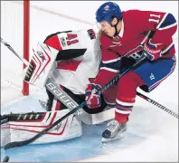  ?? CP PHOTO ?? Montreal Canadiens’ Brendan Gallagher slides in on Ottawa Senators goaltender Craig Anderson during NHL pre-season action in Montreal on Saturday.