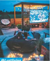  ??  ?? @Lustliving what a sweet scene! Romantic evenings are made of stuff like this: candles, string lights, a screen and a sink-in outdoor bed!