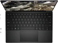  ??  ?? The XPS 13 features a standard keyboard rather than the company’s low-travel Maglev 2.